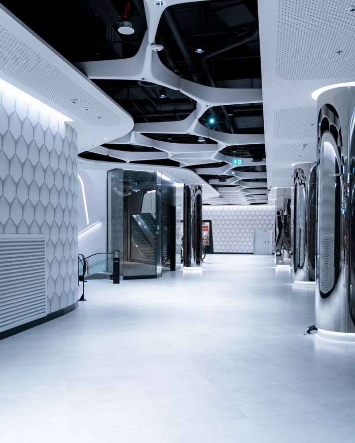 services-04 Discover the sleek and modern interior design of the Warsaw Hub with futuristic elements.
